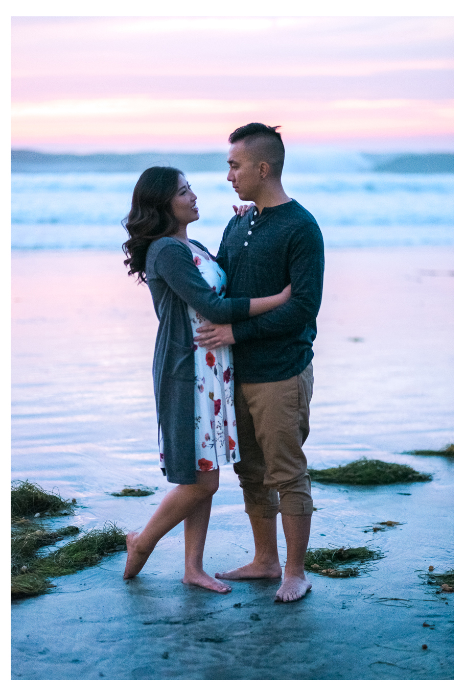 during sunset engagement session at La Jolla shores by the pier