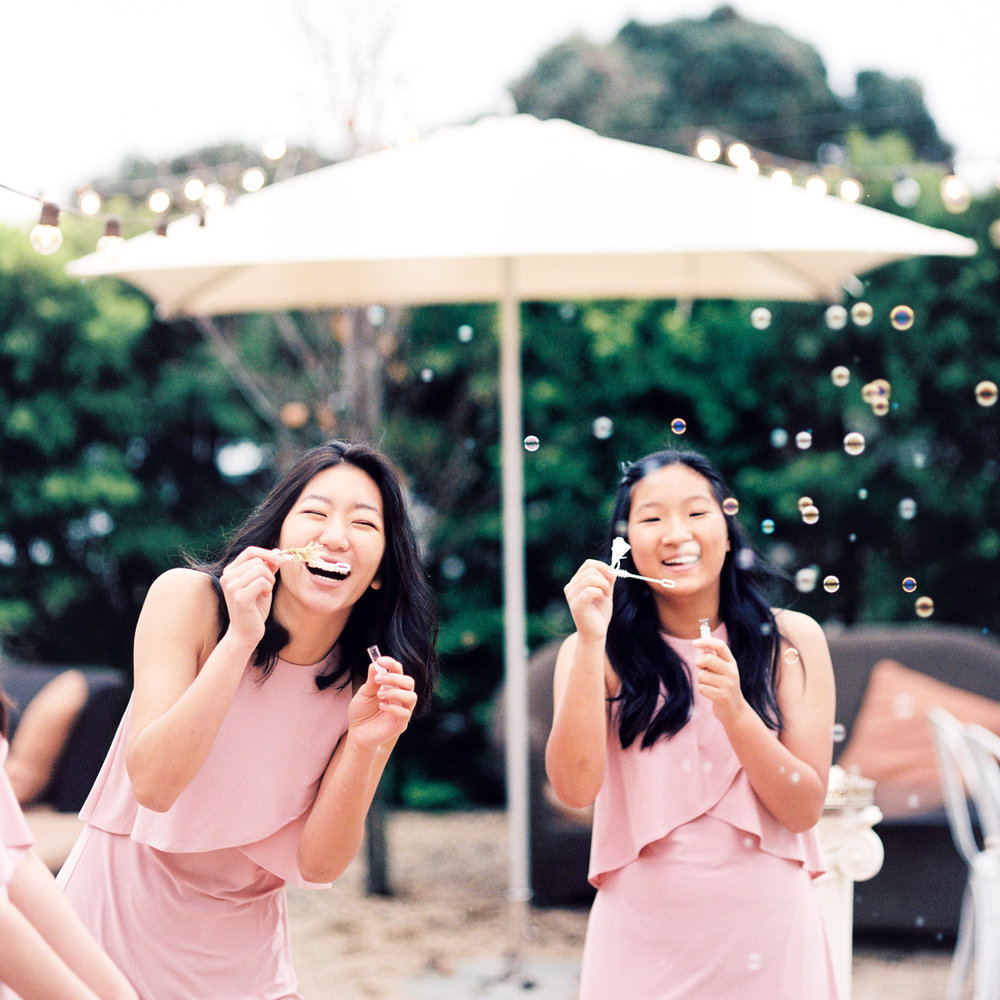  fine art wedding photography california guests blowing bubbles 