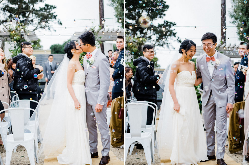 ceremony at aracely cafe bride and groom with bubbles