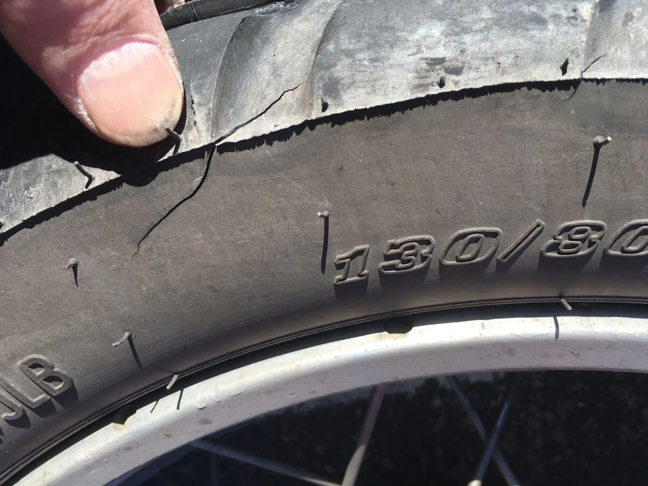 10 year old tires held up for 8,000 miles - until this, cracks at every other tread block and sidewall