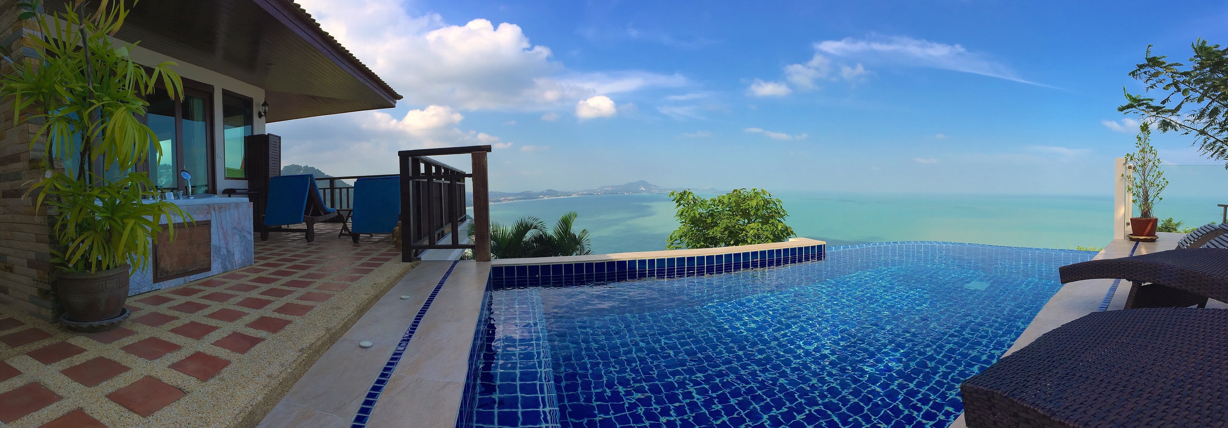 A panorama of the outdoor jacuzzi and infinity pool 