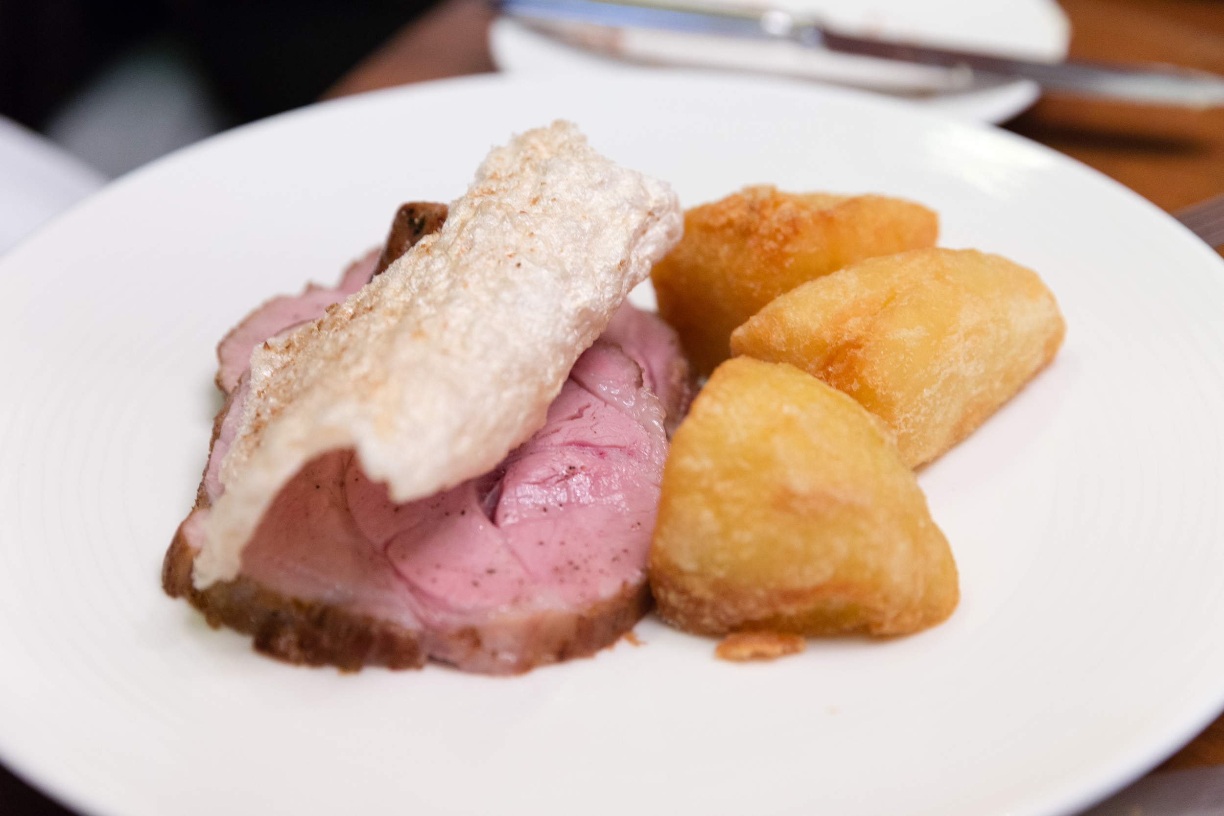 Roast Pork collar with Stuffing, Apple Sauce and Pork Cracker