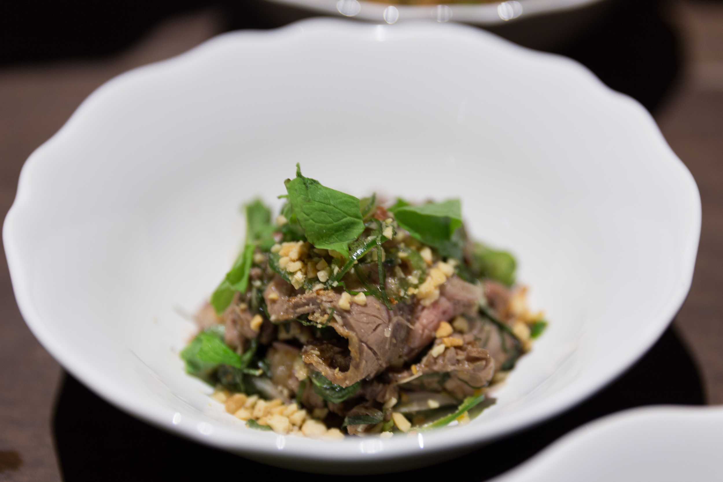 Salad of Grilled Beef, Mint, Betel Leaf, Lemongrass, Chincalok Palm Sugar Dressing