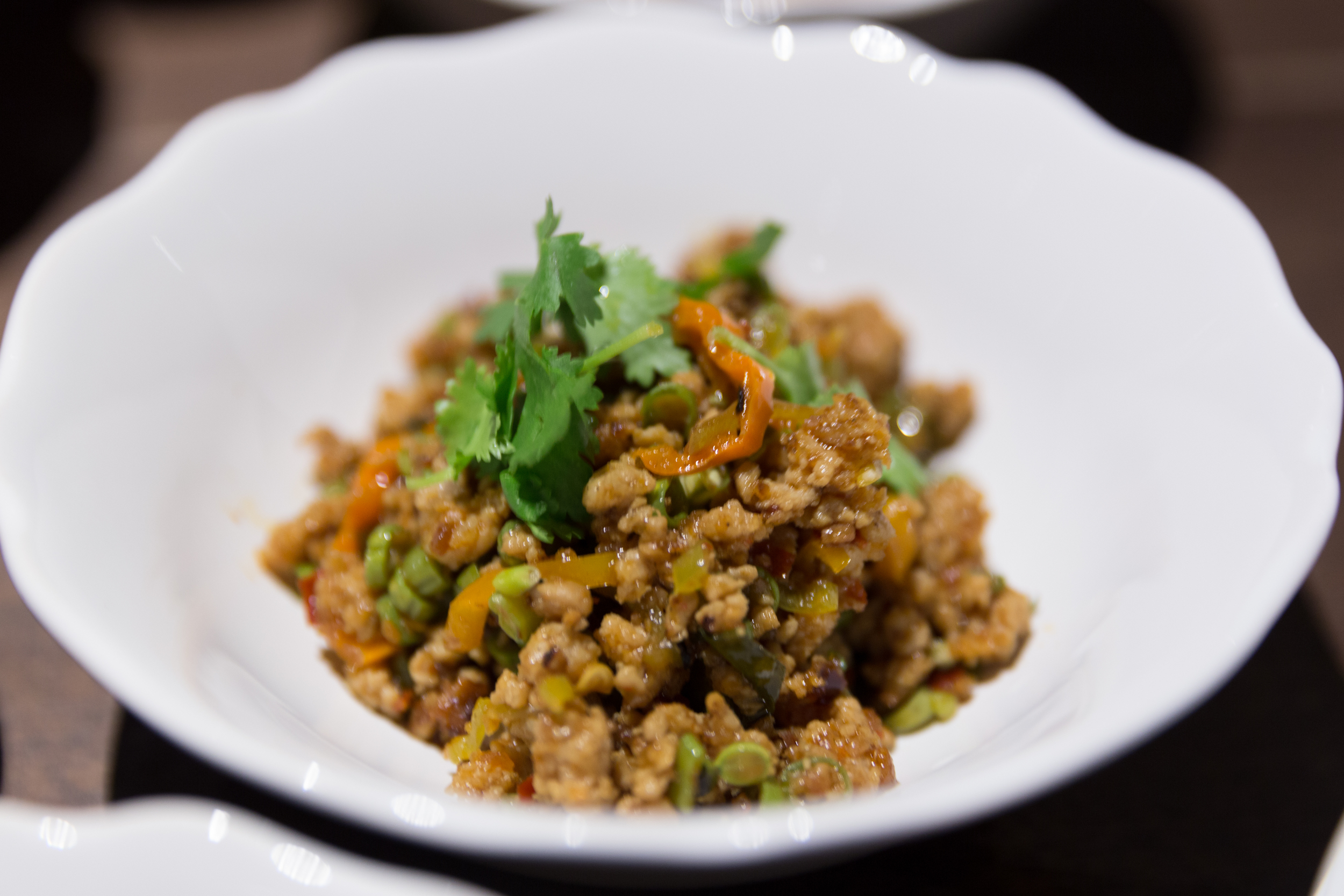 Warm Relish of Minced Pork, Banana Chillis, Laksa Leaf