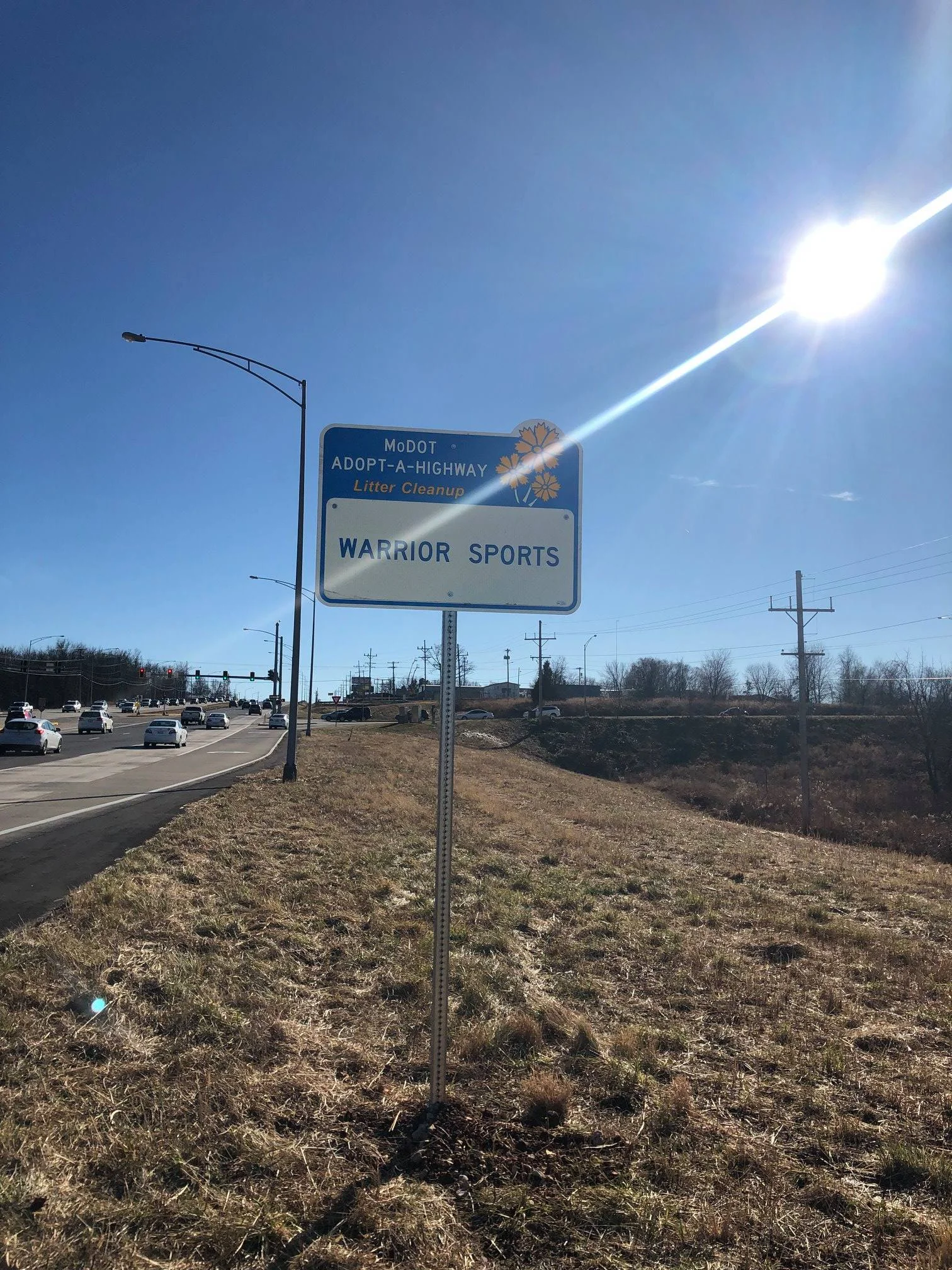 Warrior Sports Adopt a Highway.jpg
