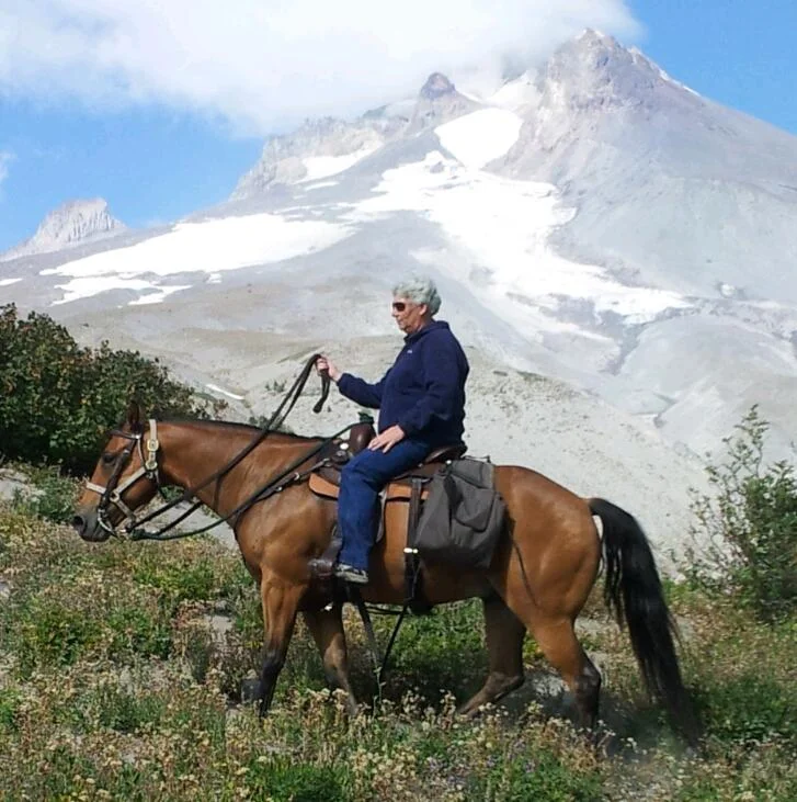 Oregon Equine Assistant Cathy enjoying her Horse Lee on a Mt. Hood trail ride.