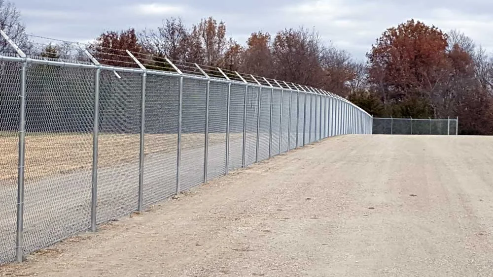 security-chain-link-with-bobwire-fencing---bernies-fence-company.jpg
