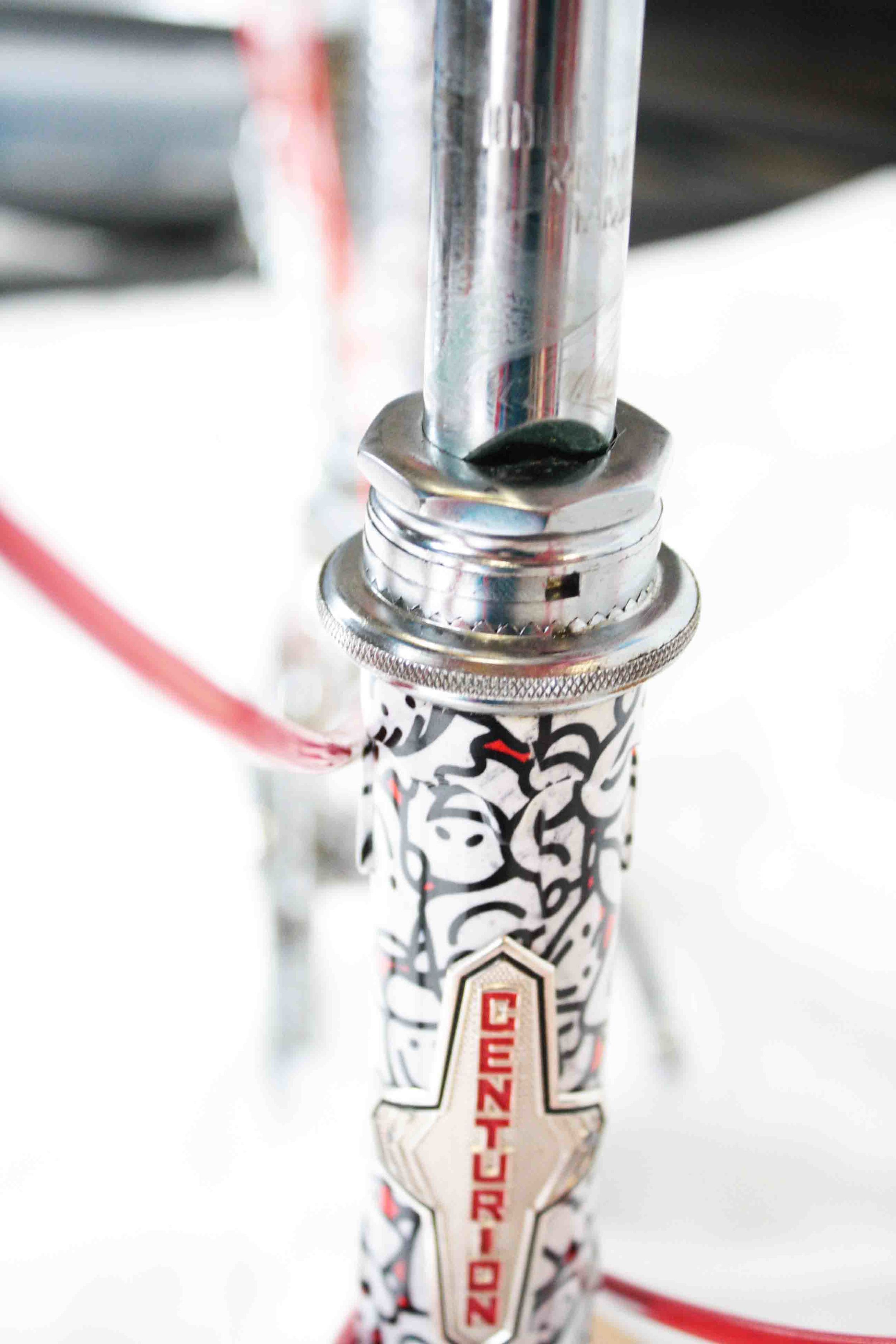 Insert the handlebar with stem assembly into the headset covering the minimum insertion line.