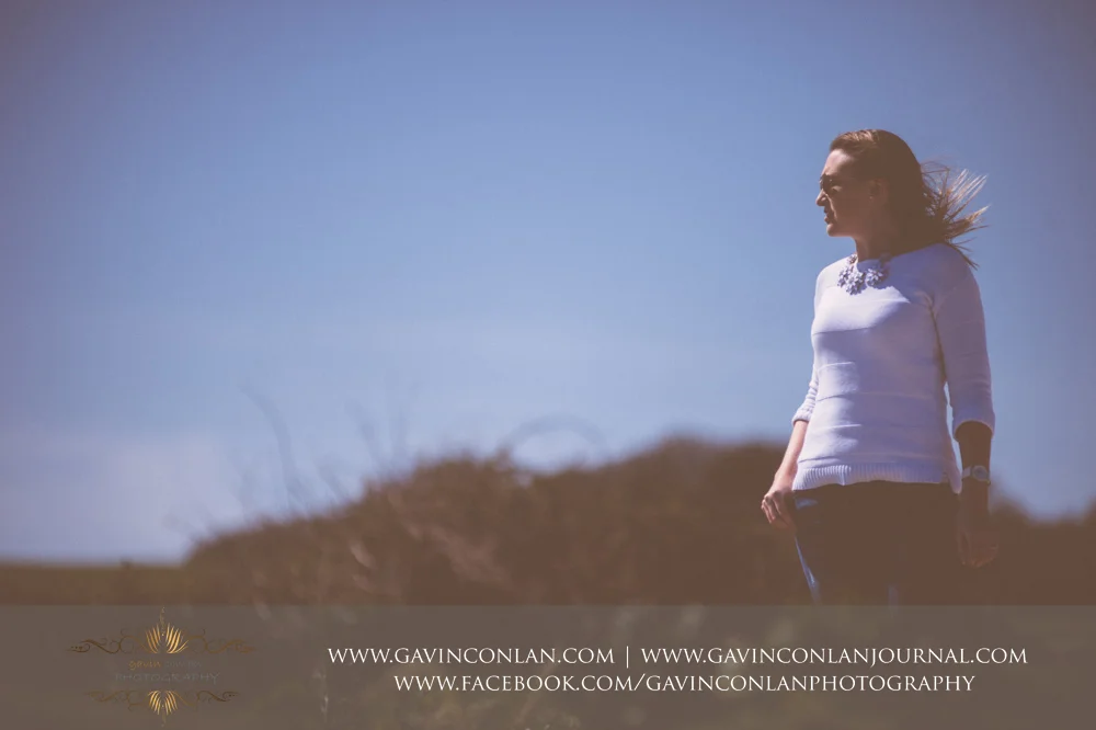 portrait of Victoria at Old Harry Rocks . Victoria and James Engagement Session in Bournemouth, Dorset by gavin conlan photography Ltd