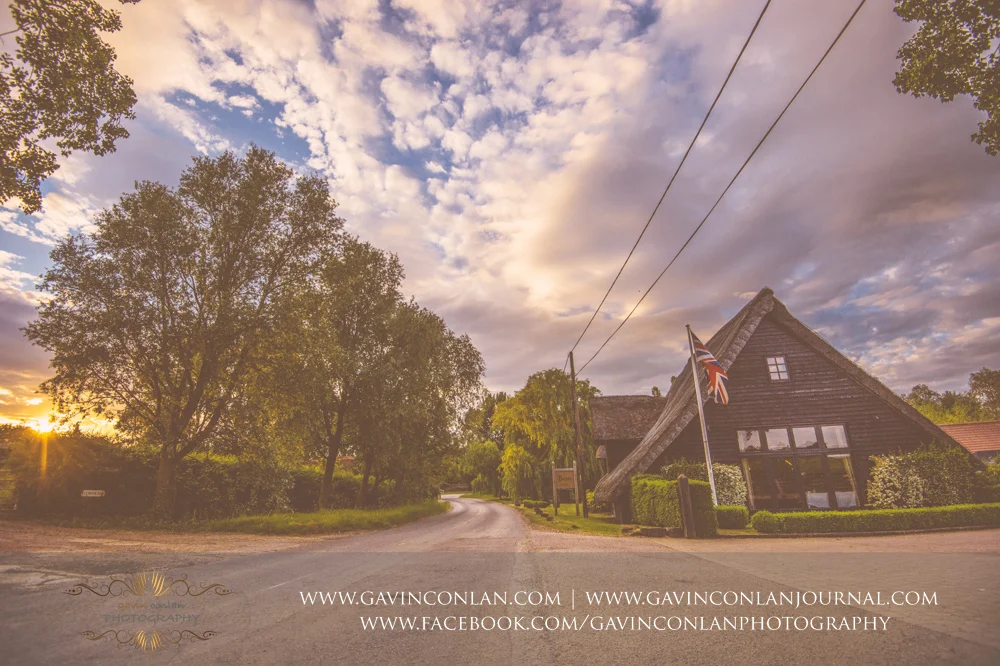 creative landscape photograph showcasing The Barn and the glorious sunset. Wedding photography at The Barn Brasserie by Essex wedding photographer gavin conlan photography Ltd