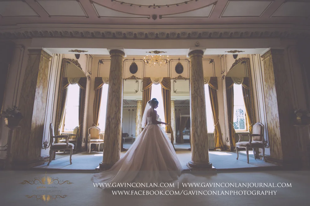 creative fine art bridal portrait in The Rococco Suite. Wedding photography at Gosfield Hall by Essex wedding photographer gavin conlan photography Ltd