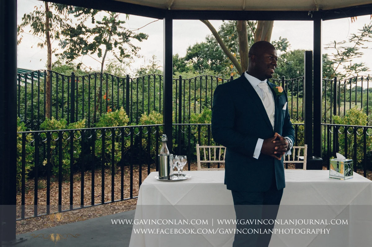 creative portrait of the groom on The Lawn at Stock Brook Country Club. Wedding photography at Stock Brook Country Club by gavin conlan photography Ltd 