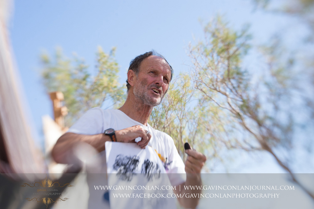  The wedding party taking an art lesson by  Visual Arts Crete &nbsp;and showcasing their artisic talent in Crete, Greece by  gavin conlan photography Ltd  