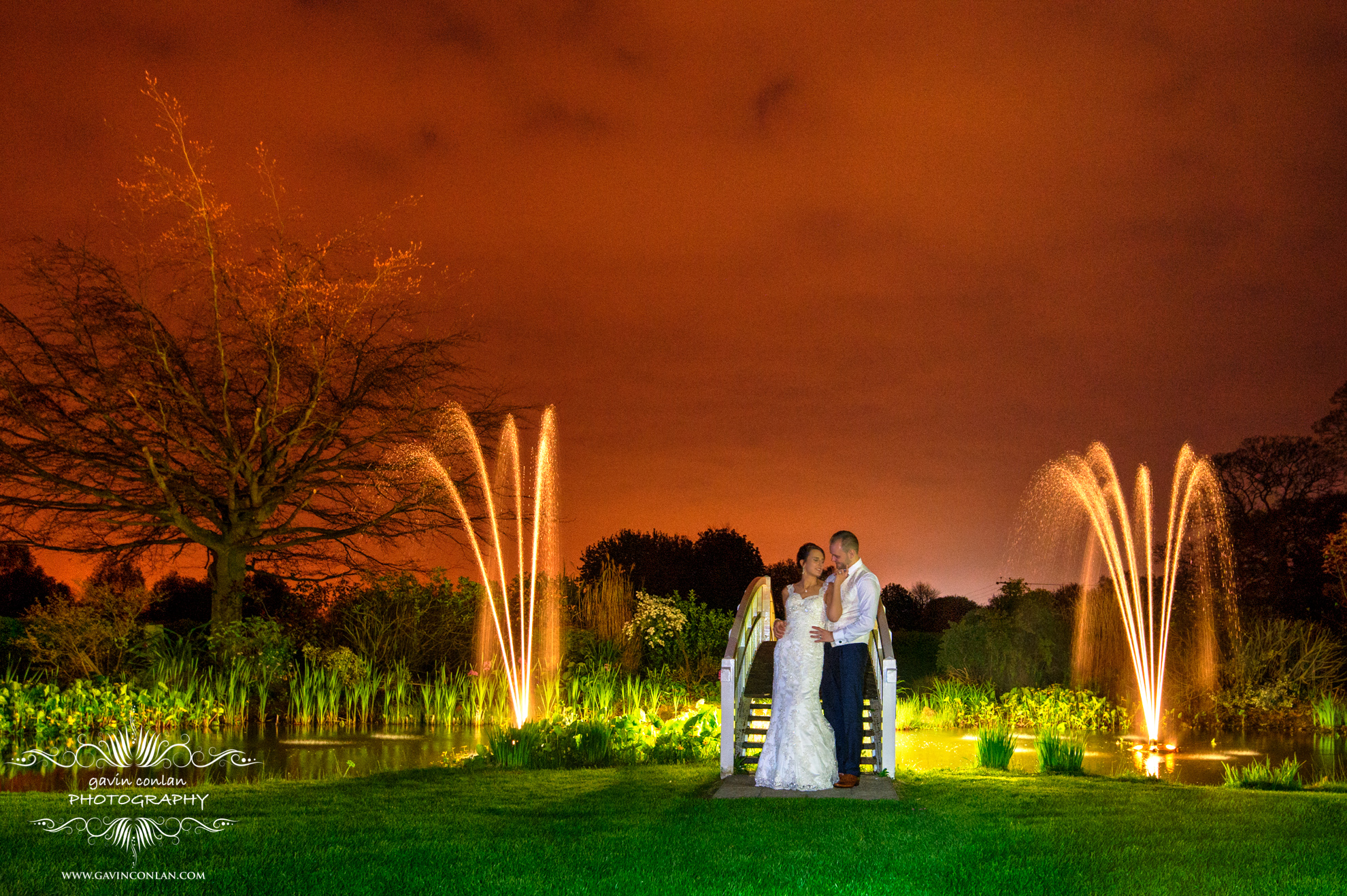 bride and groom night time portrait at the fennes