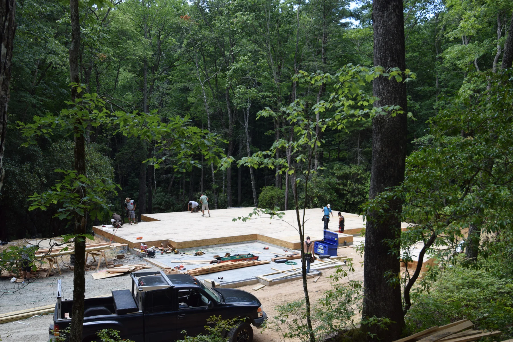 Deck is installed on the foundation. Walls and rafters will come next.
