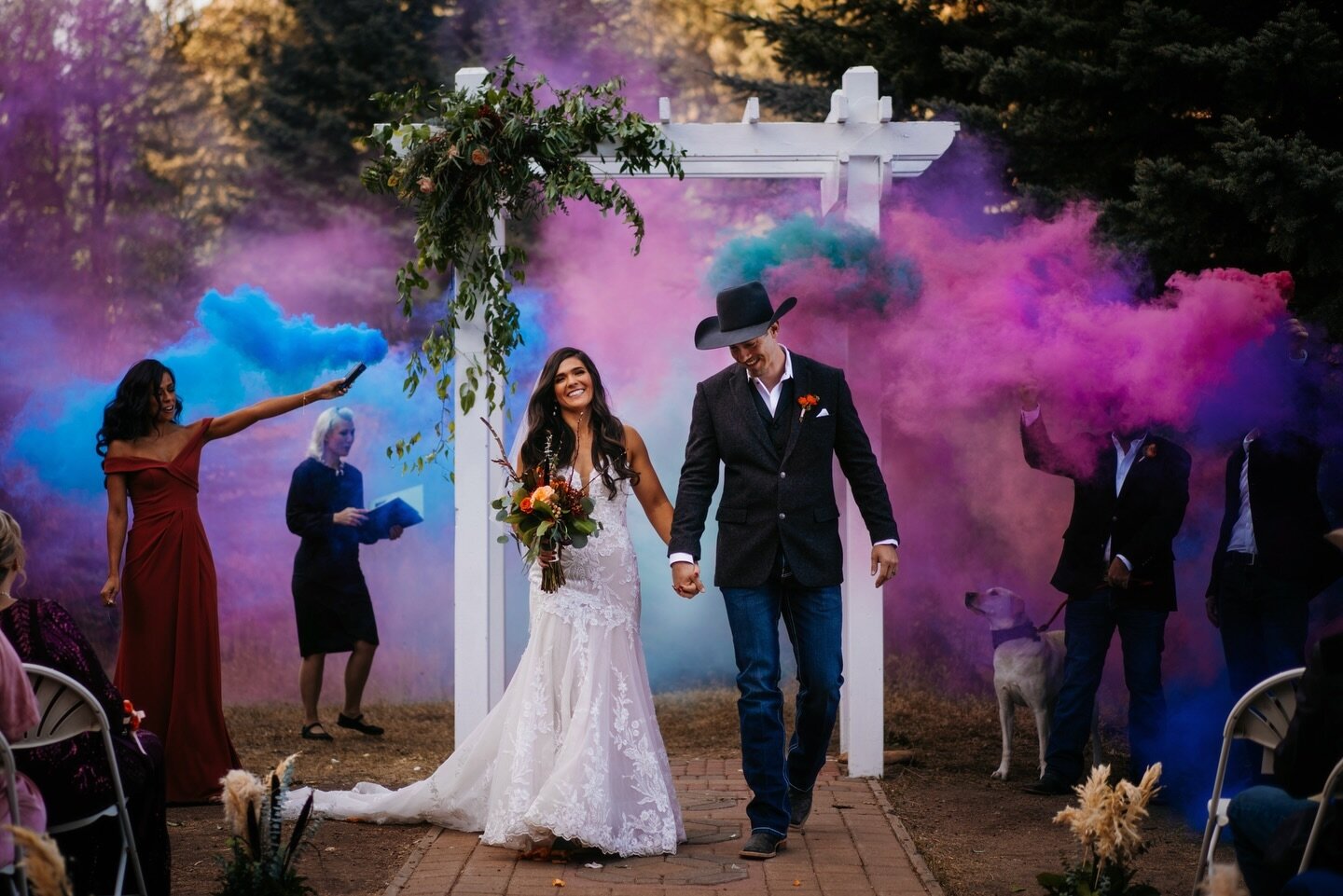 Forever will be my favorite ceremony send off of all time. I love color if you can&rsquo;t tell 🙈
.
More smoke bomb exits at ceremonies please 😍