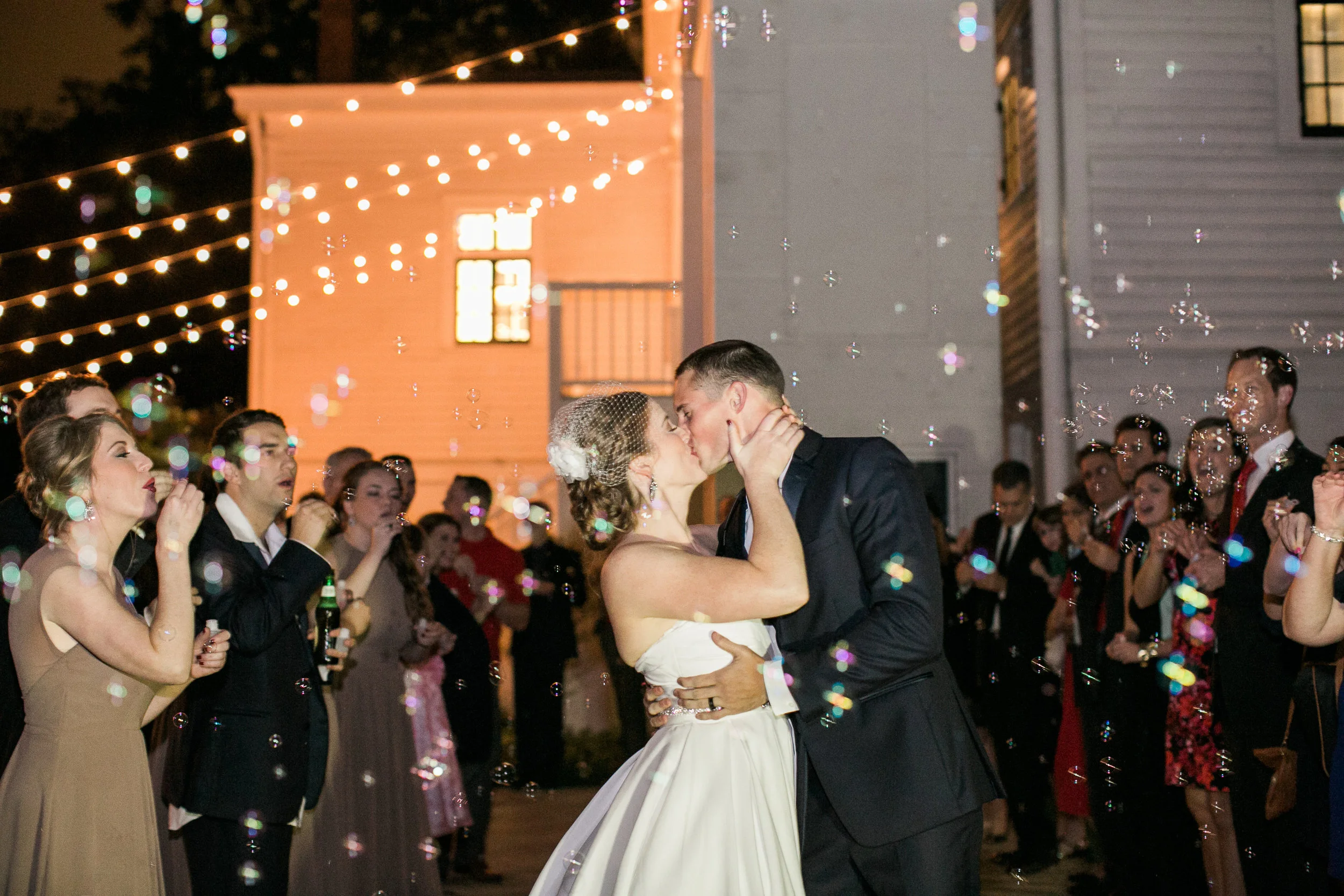 And they're off! Bubbles make the perfect sendoff favor - the rainbow effect in the camera flash is so dreamlike...(and no mess to clean up!)
