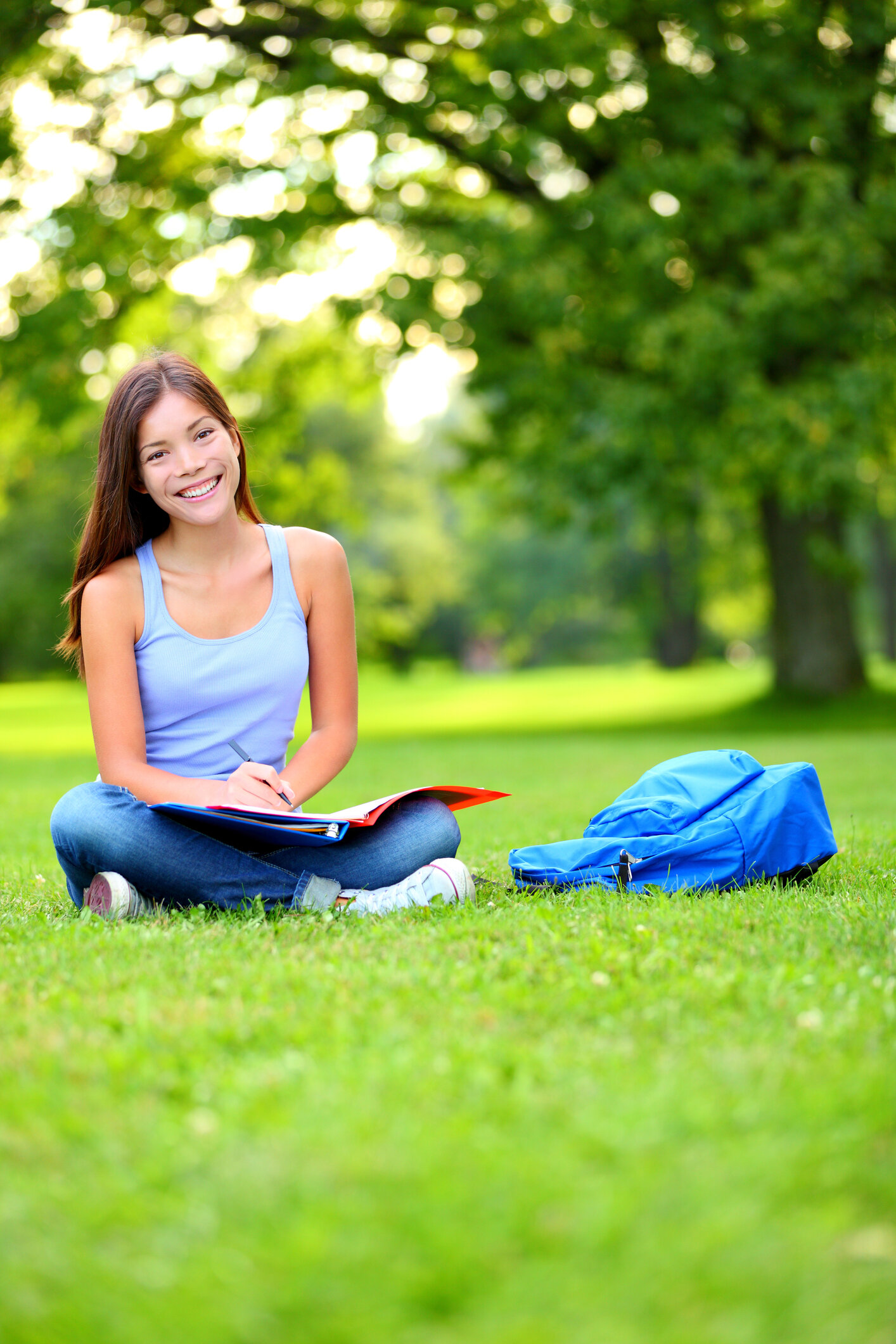 Student-girl-studying-in-park-going-back-to-school-1171650433_1416x2125.jpeg