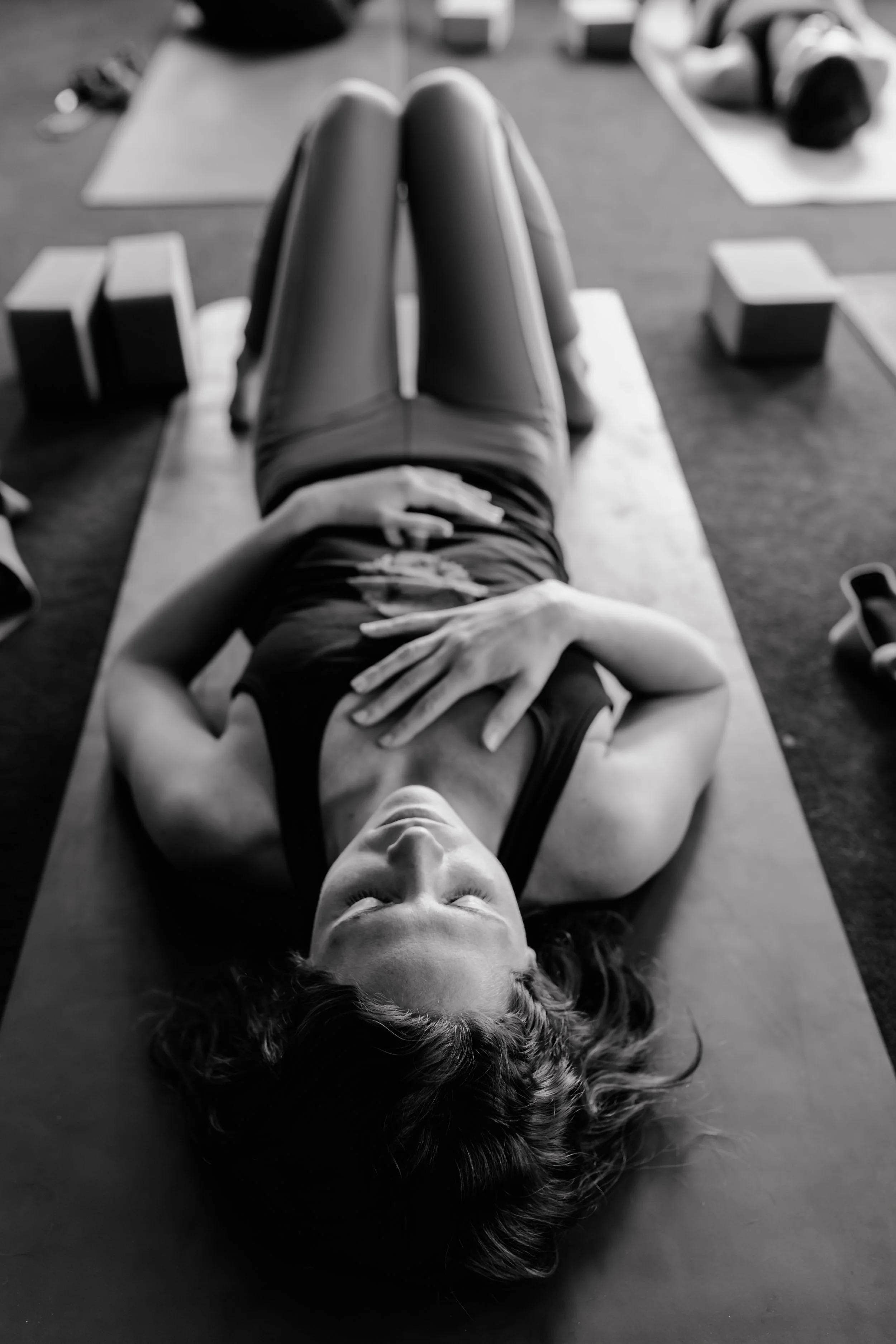 Above: Constructive Rest pose is known throughout the fields of physical and movement therapy to be one of the most healing positions for the spine. More healing than rushing through vinyasa? You betcha. It should be held at least 5 minutes for optimum benefits. extra credit if you touch your body, as pictured, creating extra connection with your breath #lunamunn Below: Dan offers a loving mudras after we interrupt his epic yogic rest in front of the woodfire stove at our annual Sierra Yogascapes retreat #colehatcherphotography