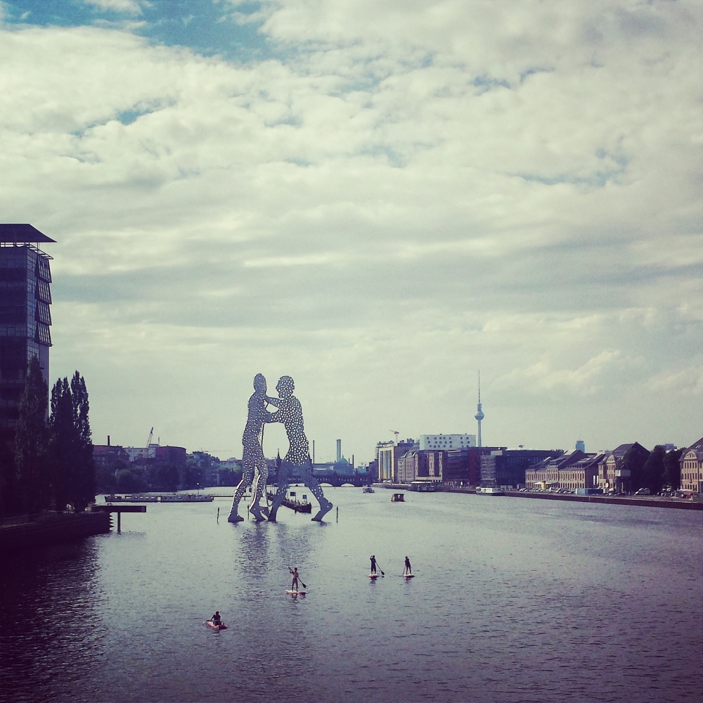People paddle boarding down the river Spree, I want to do that some time