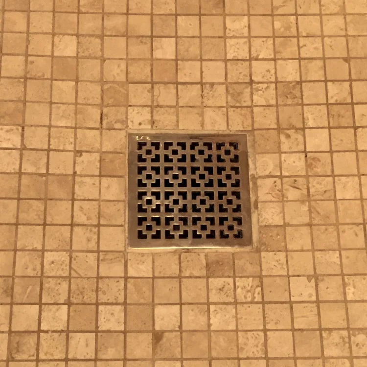 Love this decorative drain cover!