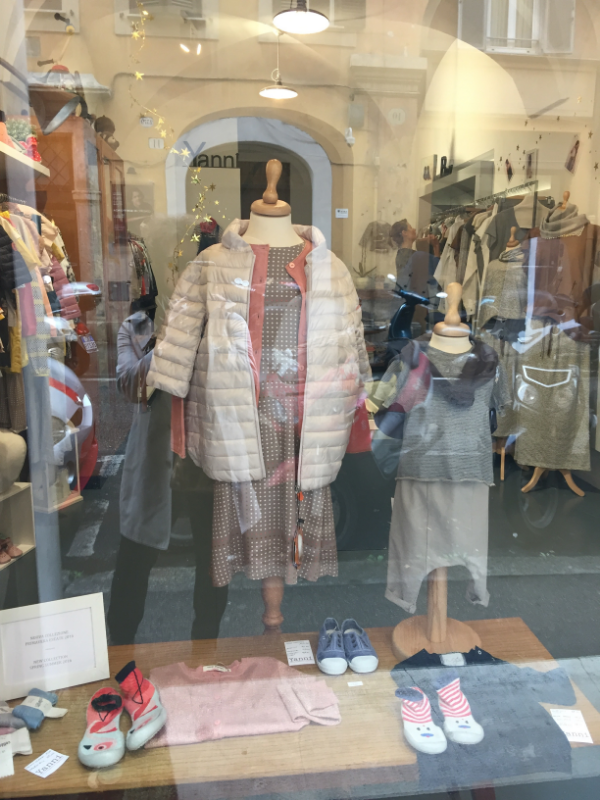 Rome window shopping. Incredible children's clothing! I think I would wear these things. Maybe not the shoes......