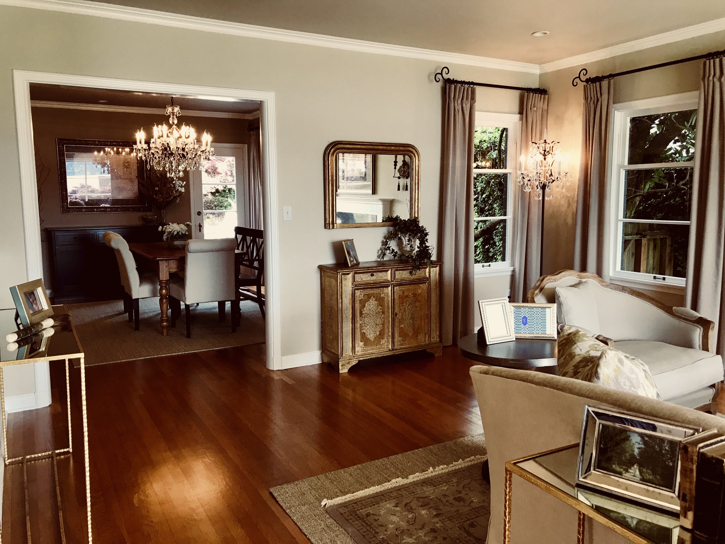 A painted Italian cabinet and Louis Philippe mirror add European charm