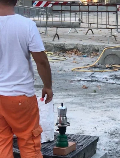 We watched the re-paving of the street in front of our piazza beginning in April. By July, it was awfully hot in the street. This fellow makes his own coffee break!