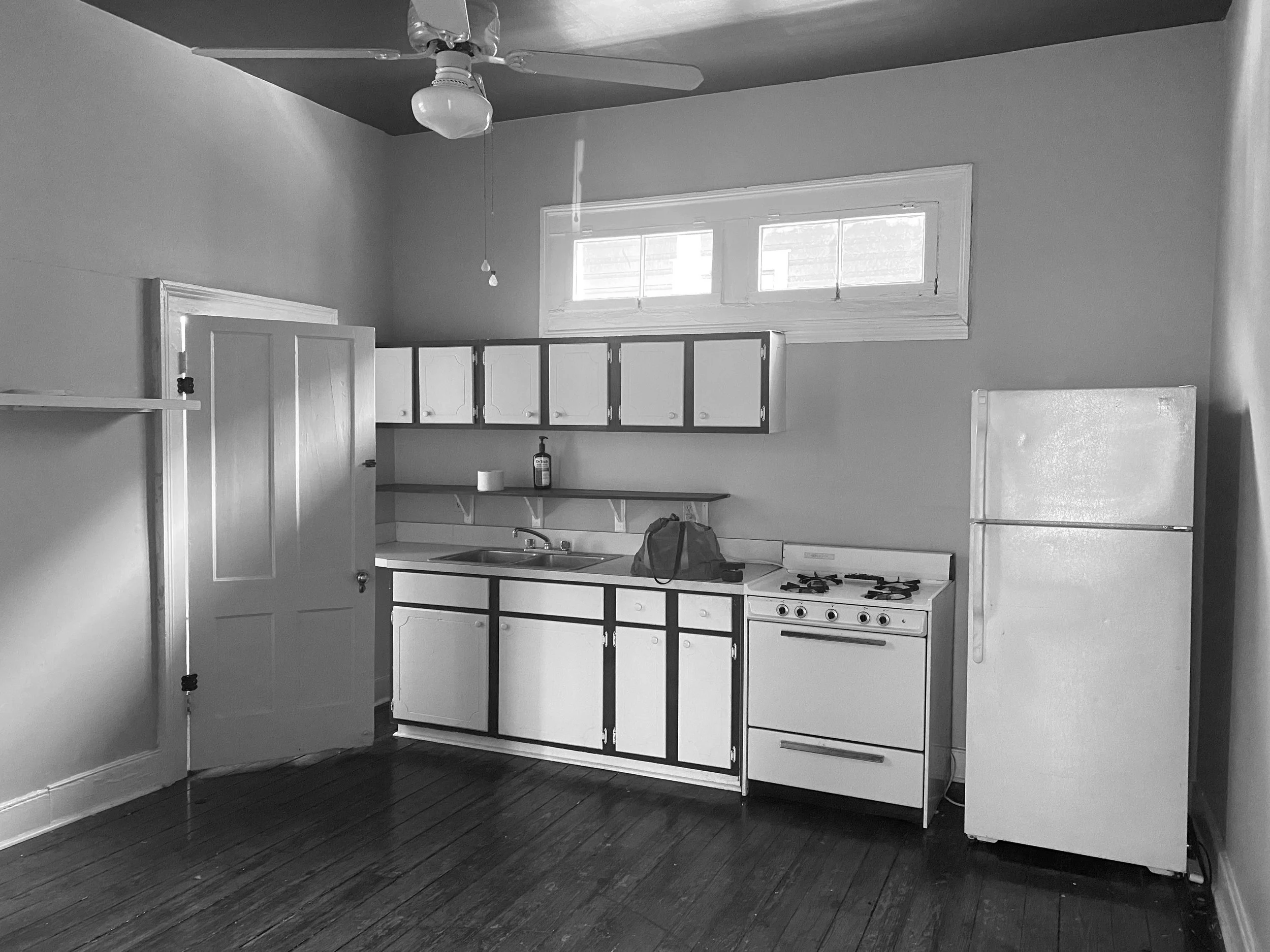 UNIT C KITCHEN BEFORE.JPG