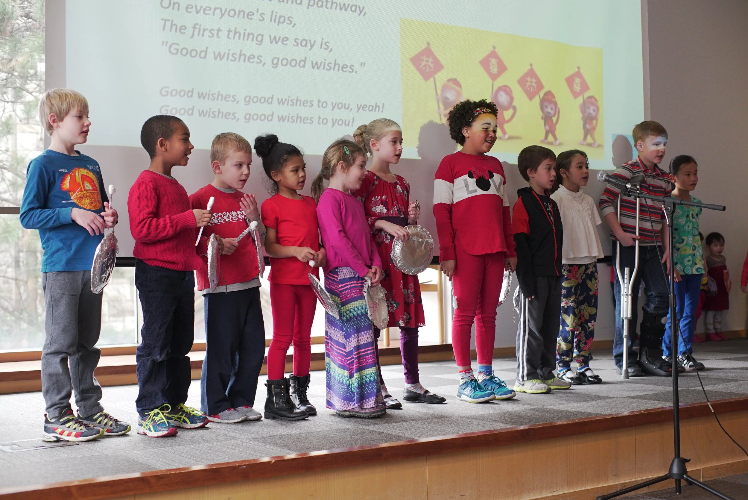 Lincoln Elementary students with Paper Lantern student during Chinese New Year 2017 performance