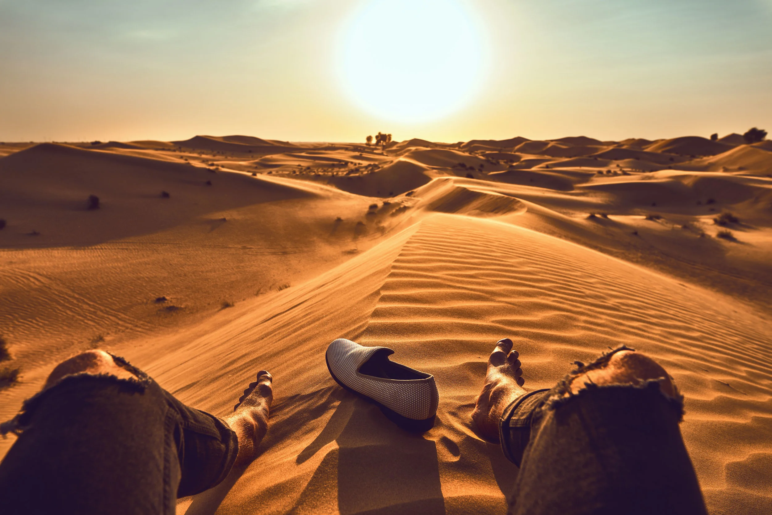 sit-with-me-D&D-between-legs-dubai-desert.jpg