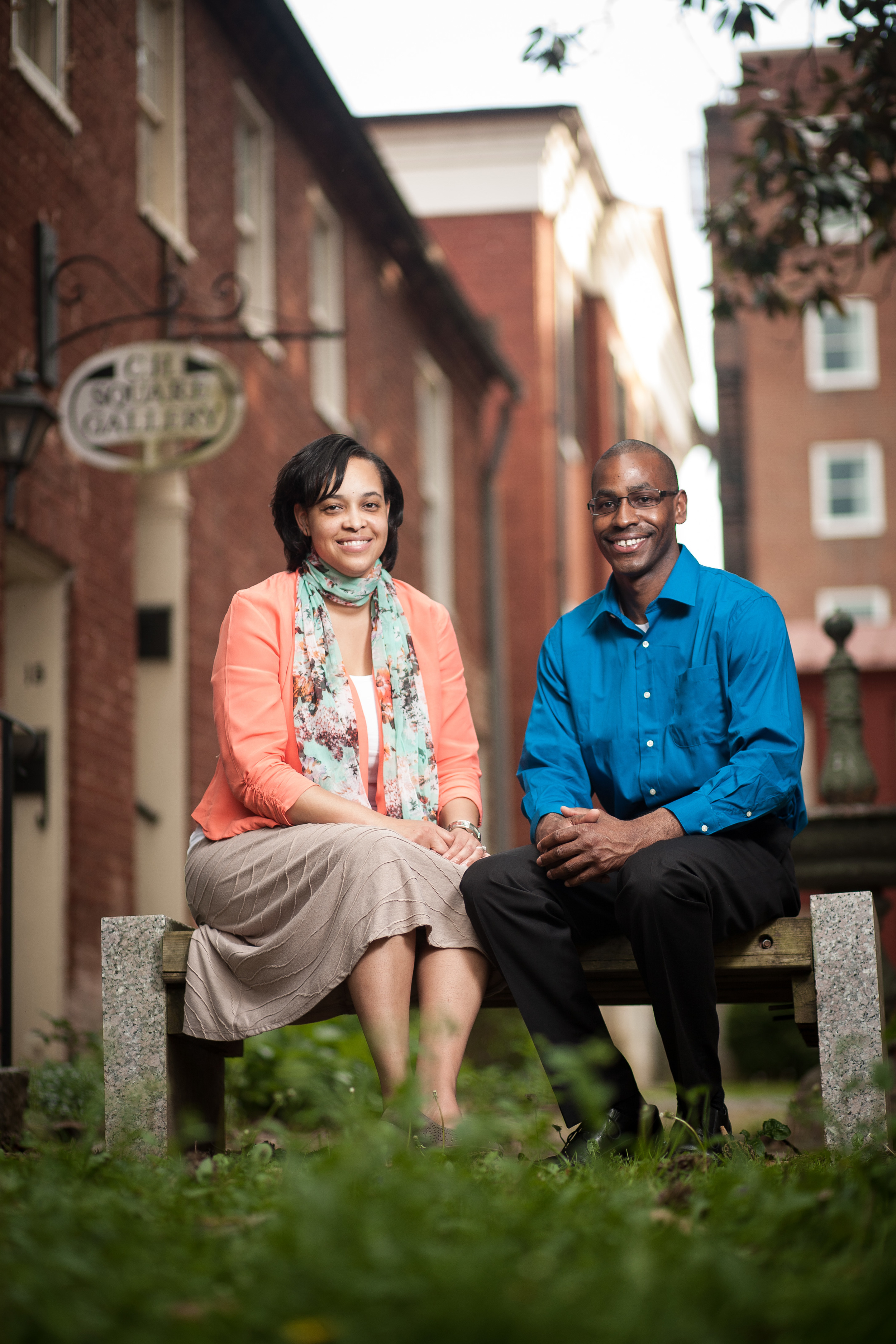 Engaged Couple posed on bench in Lexington, Virginia