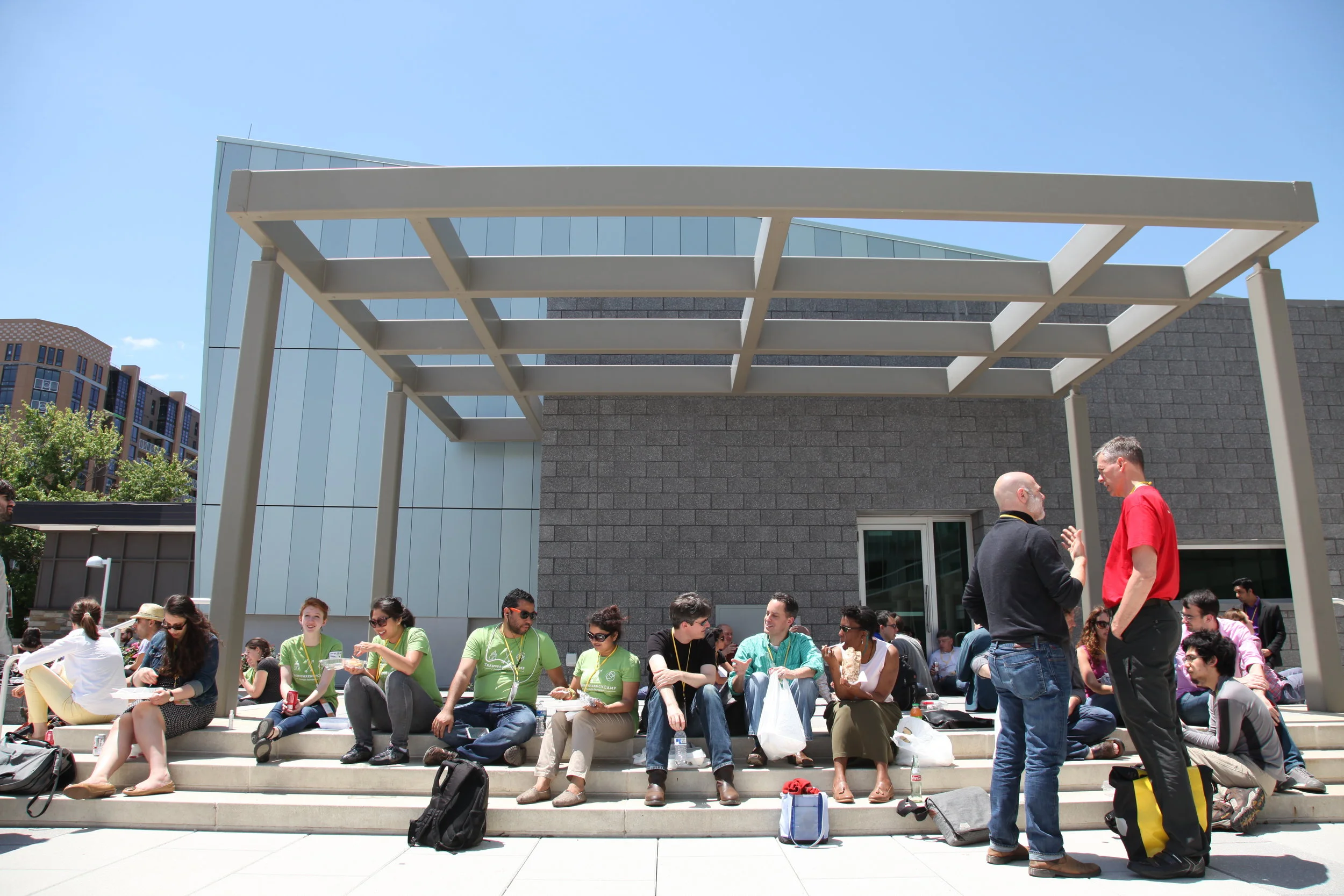 Bright green TransparencyCamp shirts make conference volunteers stand out and easy to find