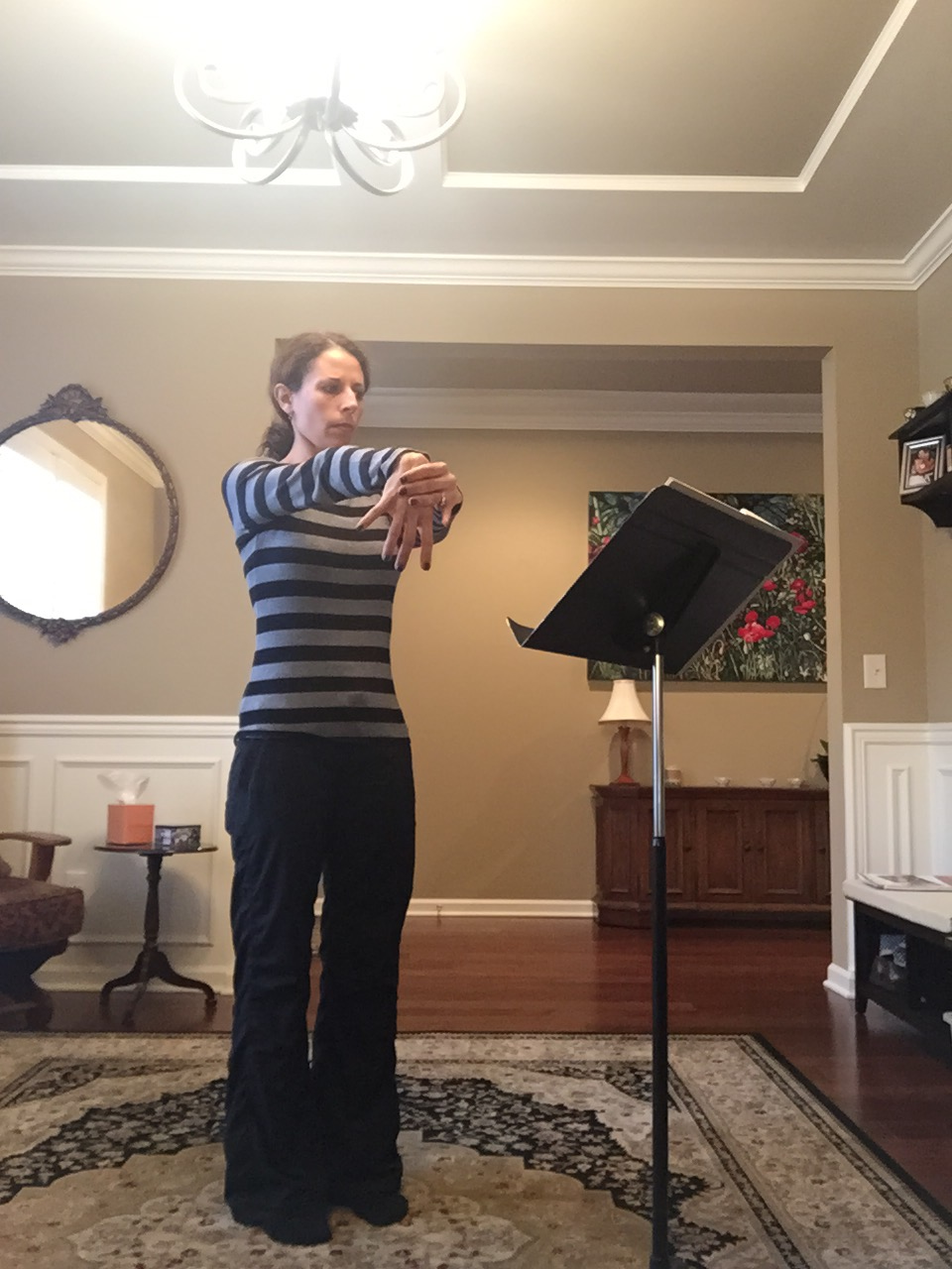 This week I'm practicing for the Knoxville Opera's production of HMS Pinafore. It's important for flutists to stretch their wrists!