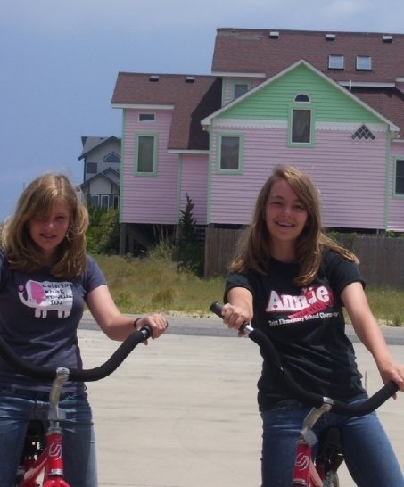 couldn't find the pic where cat's hair is pulled back so tightly she looks bald... but here's the oldest picture of us i can find. we've come a long way since 2006 (OR HAVE WE)