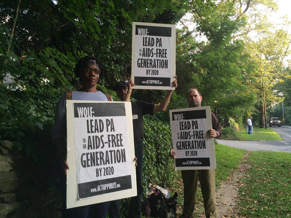 ACT UP members wait for Tom Wolf to arrive at his fundraiser.