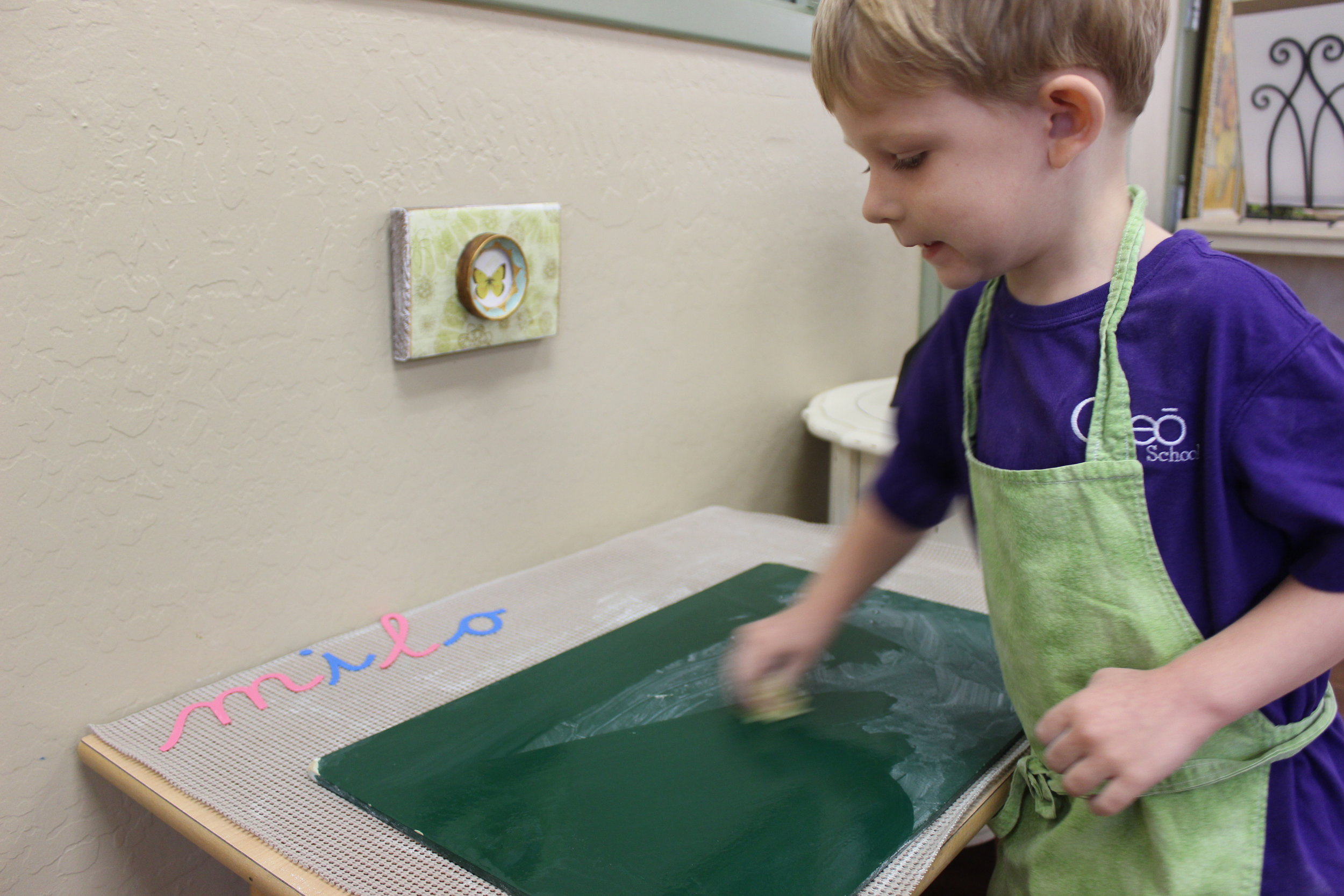 Independence is washing the chalkboard after you're finished working with it. 