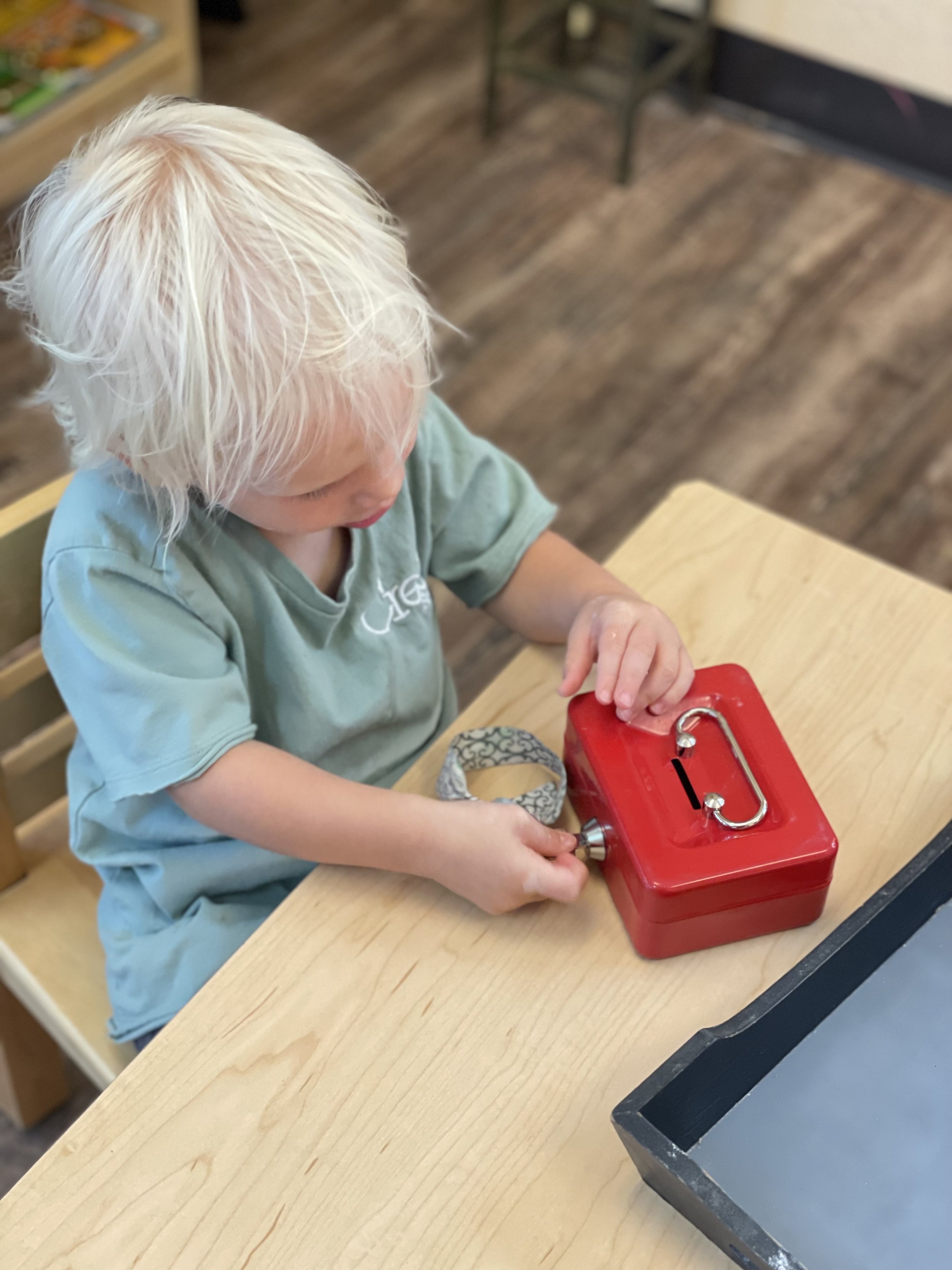 Waylon using the key and lockbox.jpg