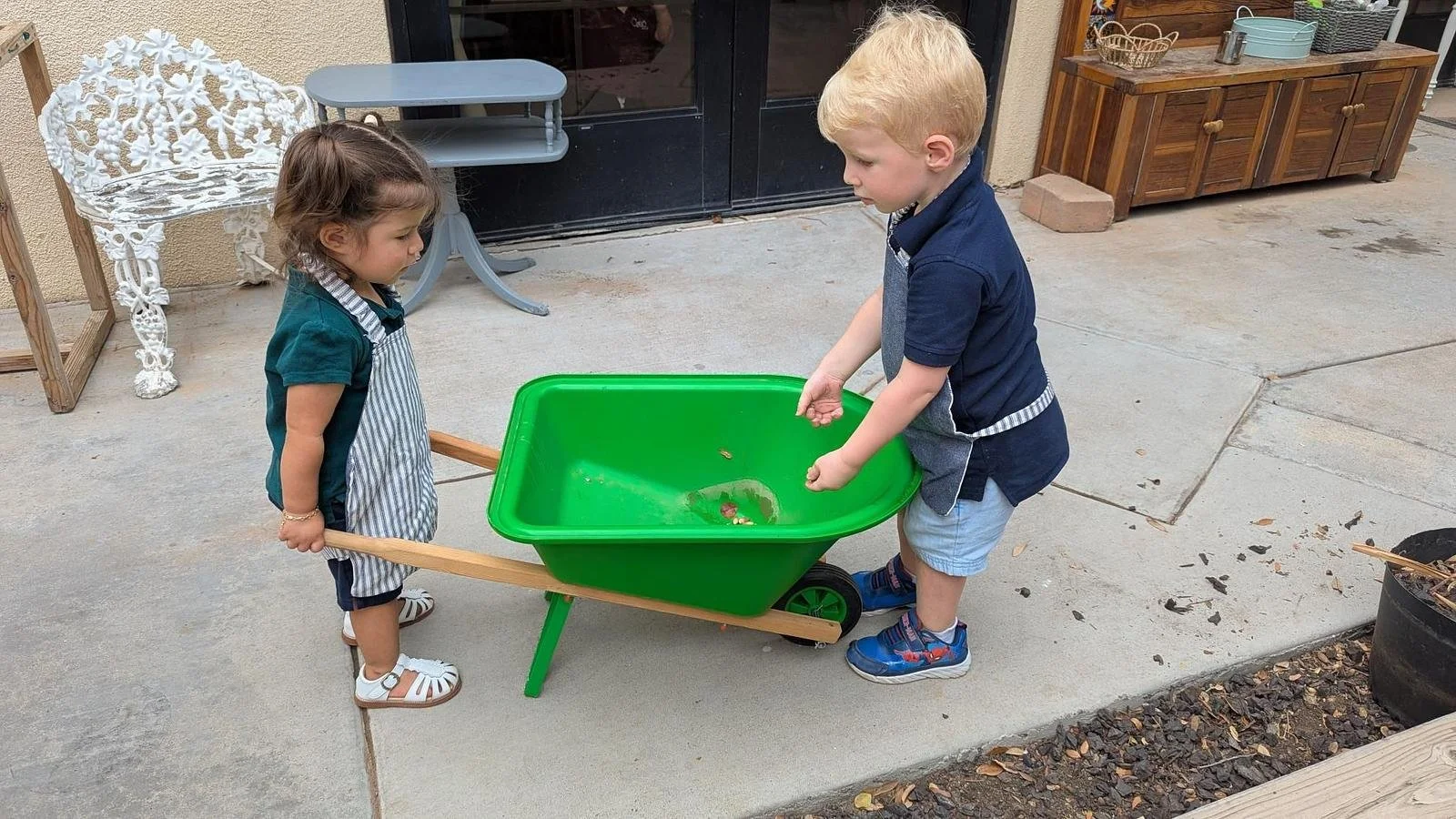 Lincoln and Zara wheelbarrow.jpg