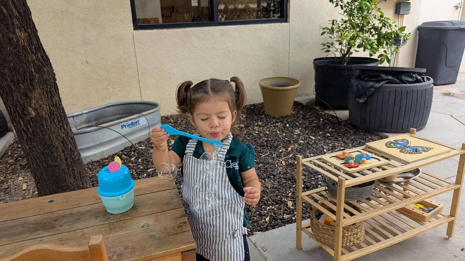 Zara blowing bubbles.jpg