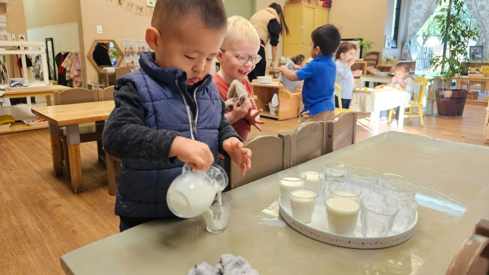 Eddy pouring milk.jpg