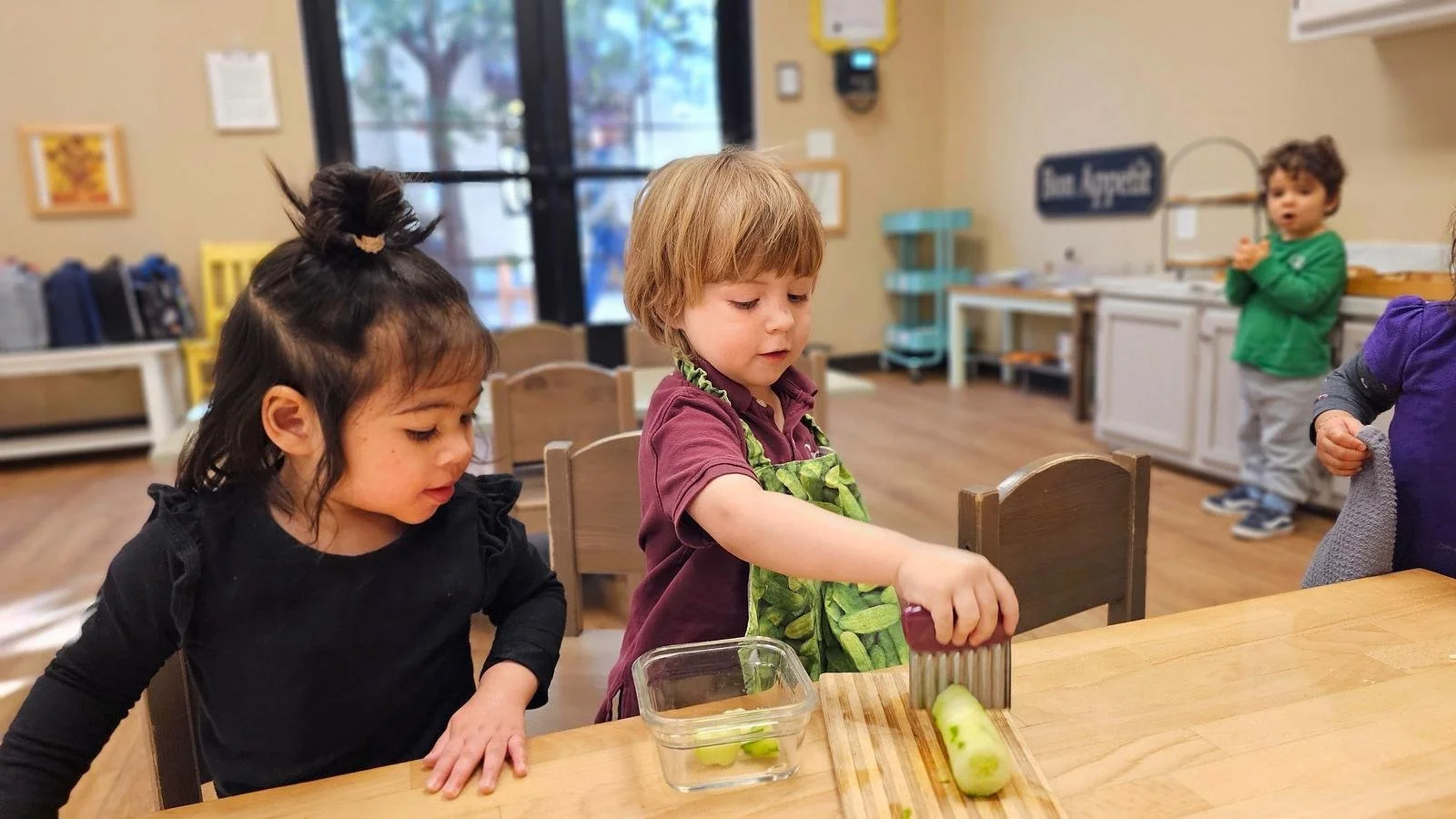 Oliver slicing cucumbers.jpg