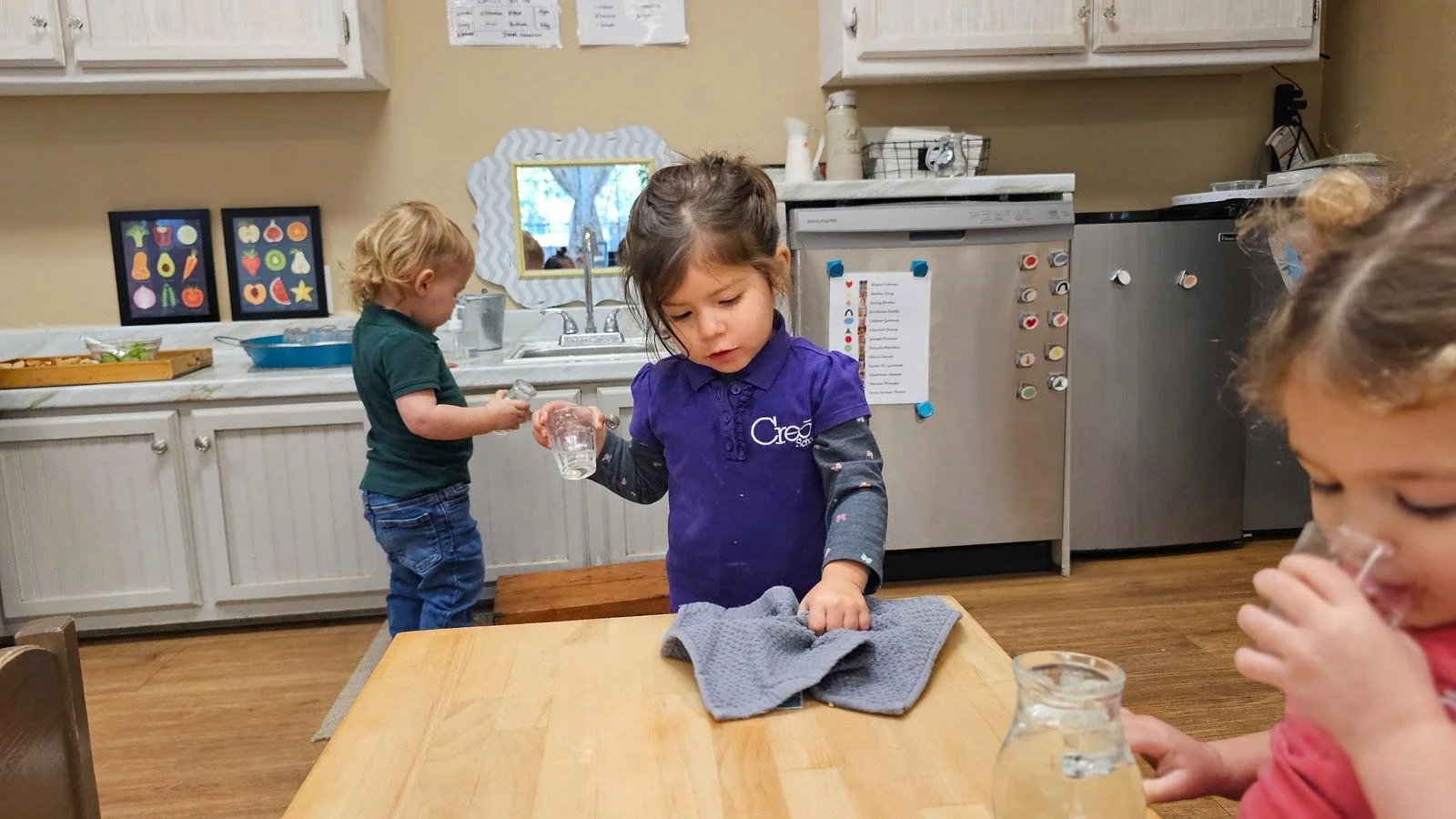 Zara wiping up spill.jpg