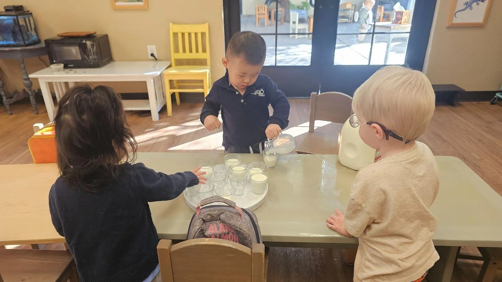 Eddy pouring milk.jpg
