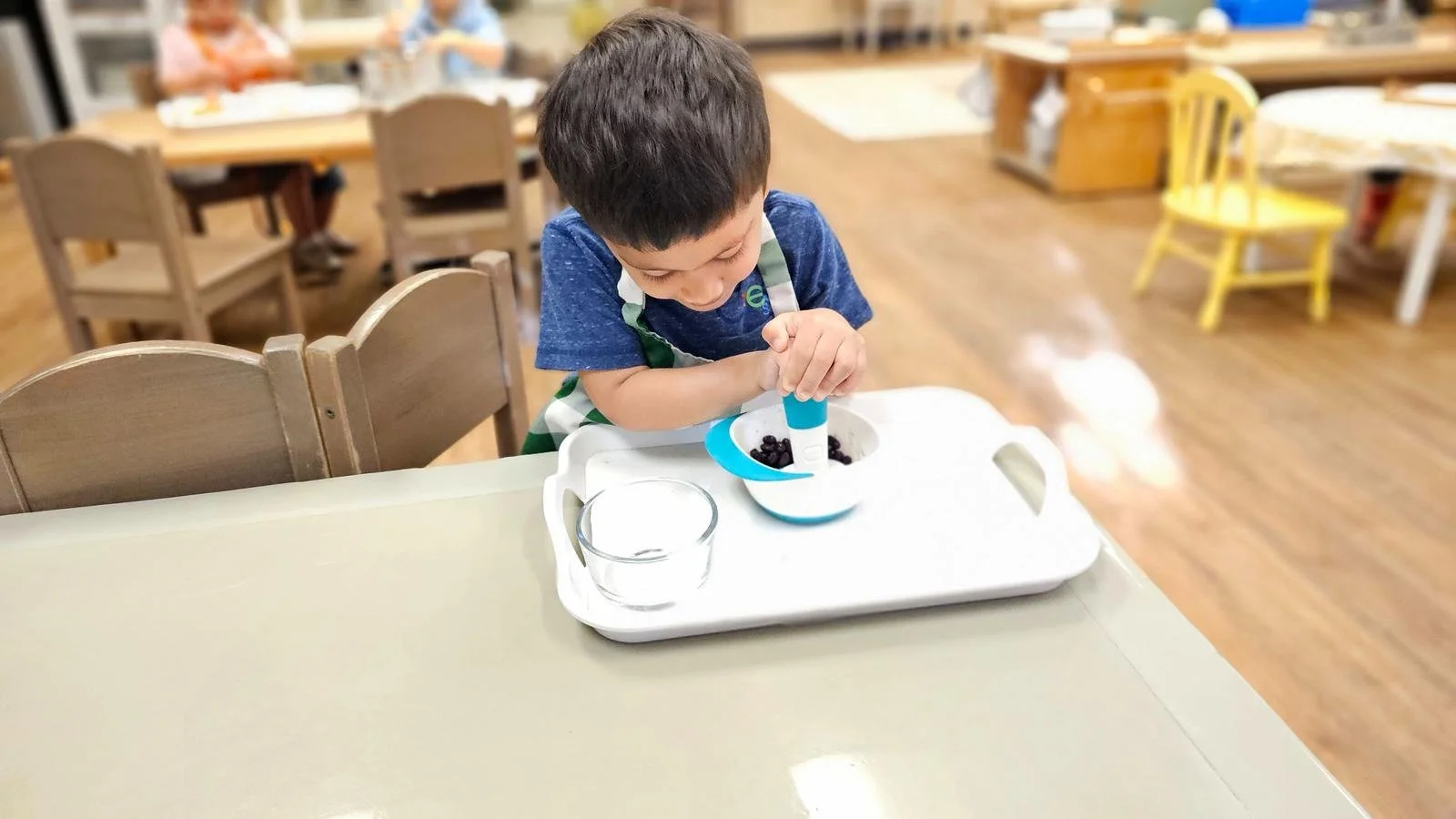 Shivam smashing black beans.jpg