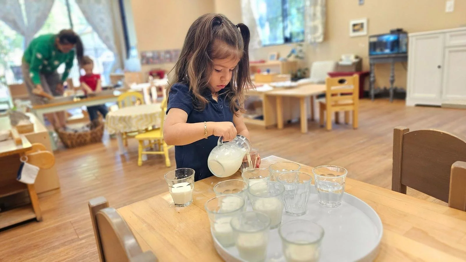 Zara pouring milk.jpg