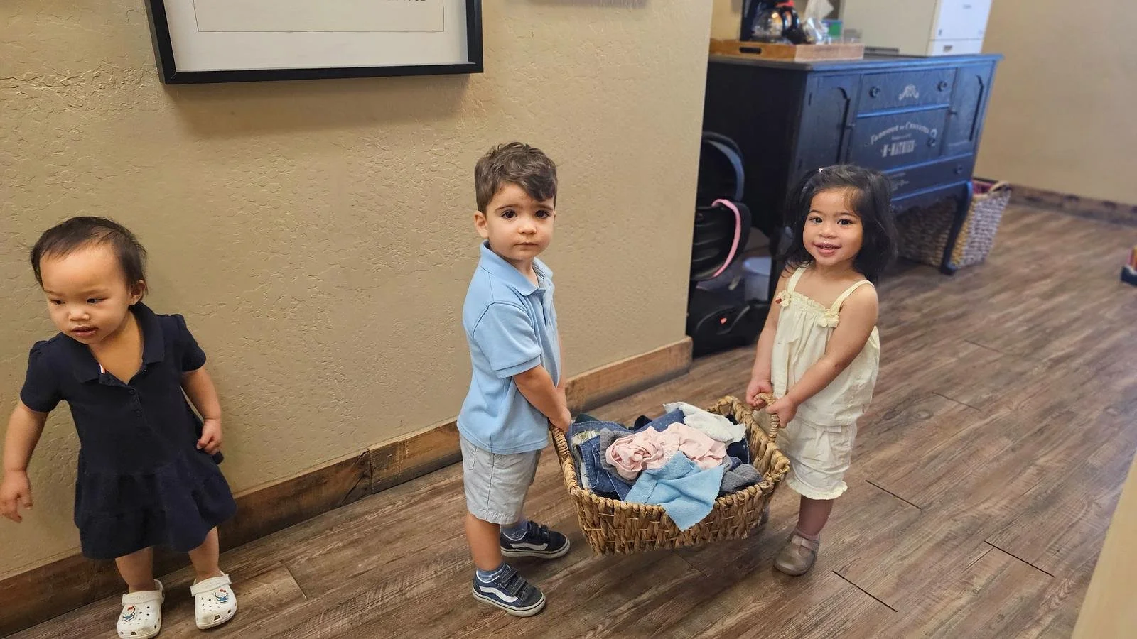 Sebastian Avery and Amelia carrying the laundry.jpg