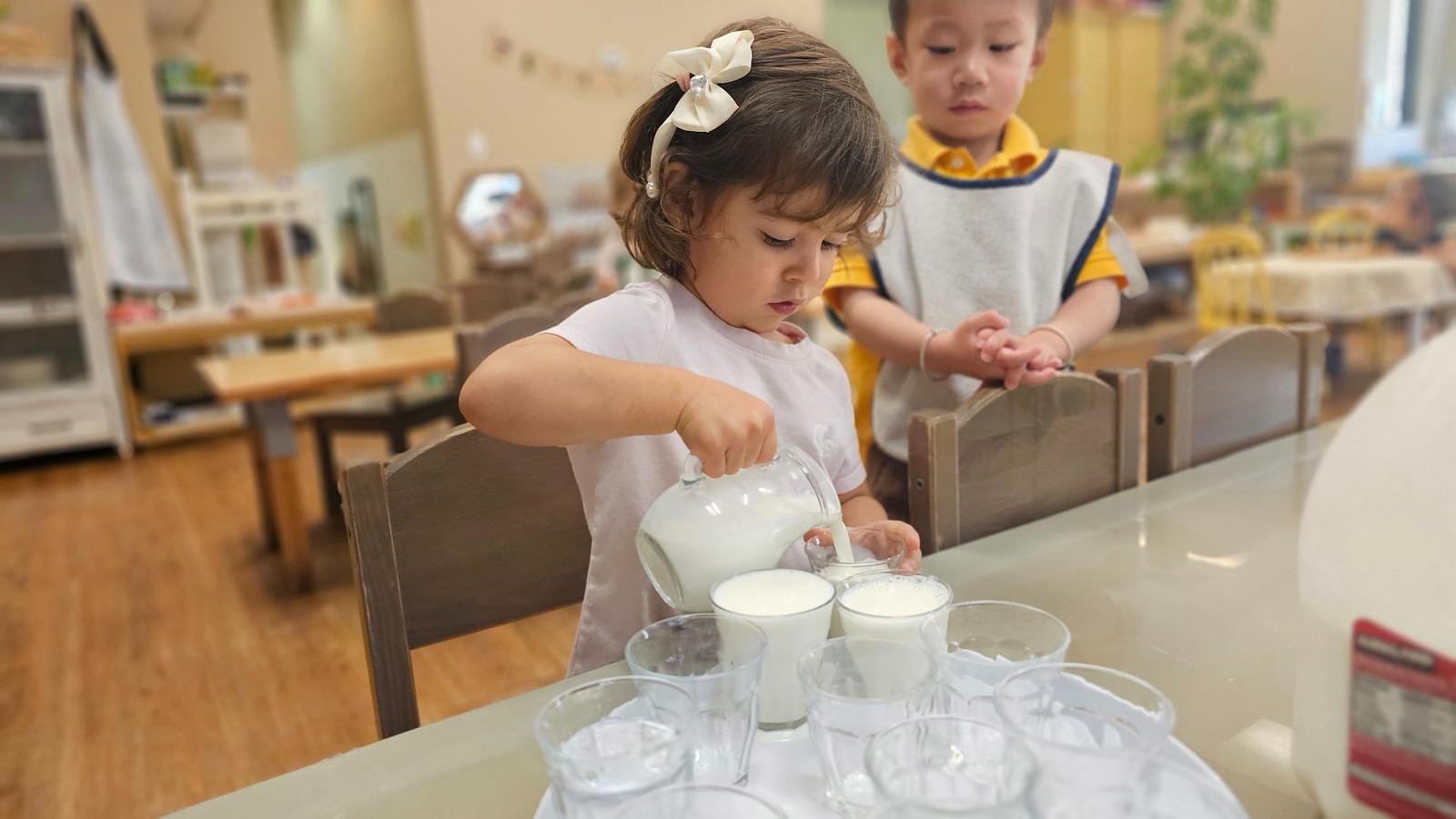 Alana pouring milk.jpg