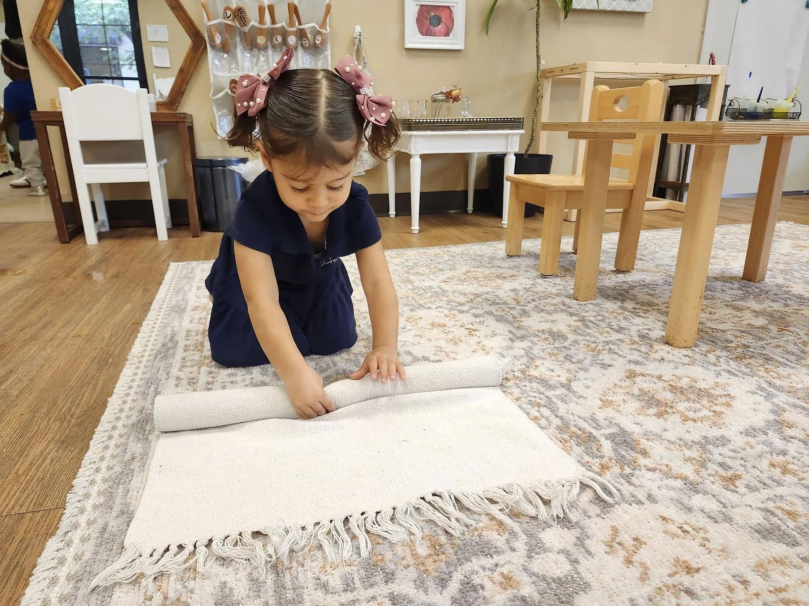Alana rolling up rug.jpg
