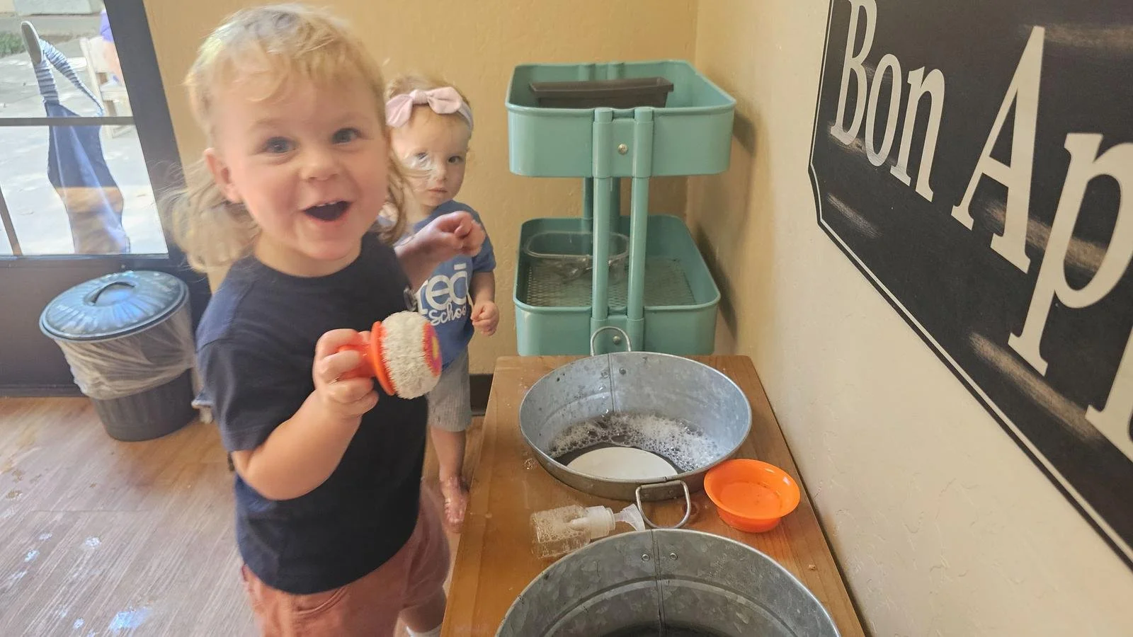 Beckham washing dishes.jpg